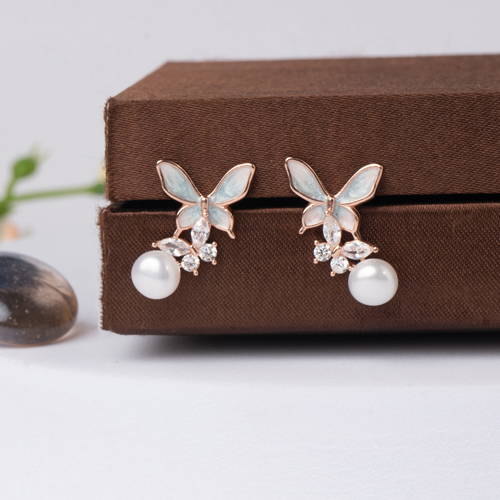 Pearl Petal Butterfly Studs