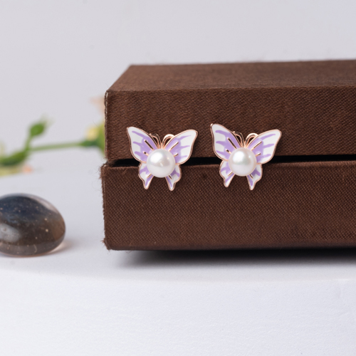 Pearl Glow Butterfly Stud
